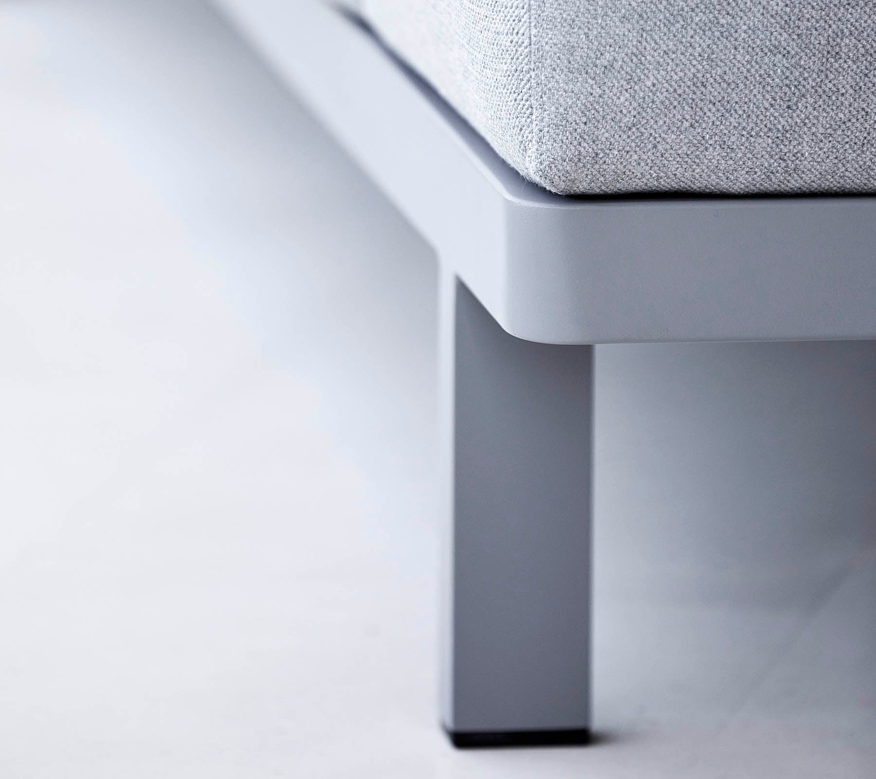 Contemporary furniture leg in a sleek design, featuring a smooth finish and minimalist style that complements modern aesthetics.