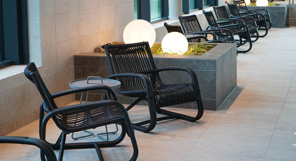 Cane-line Curve lounge chair in black at Marissa Ferienpark's spa