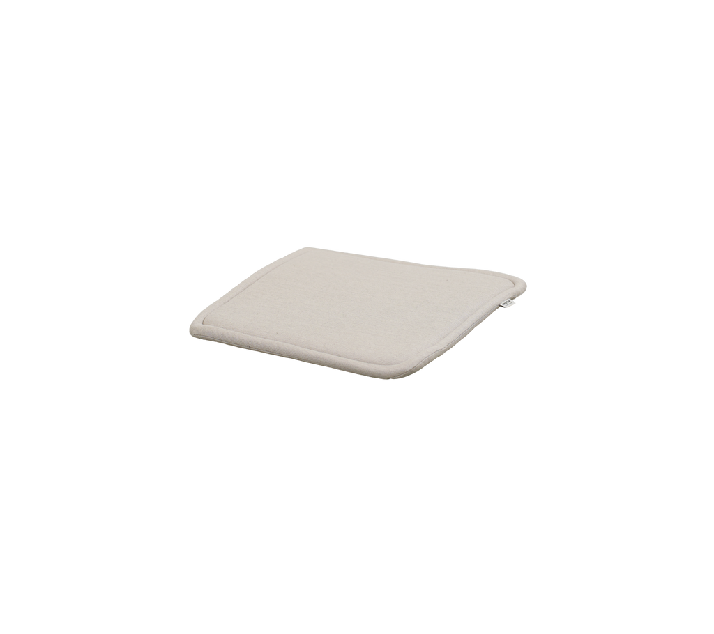 Square sand cushion with a soft design.