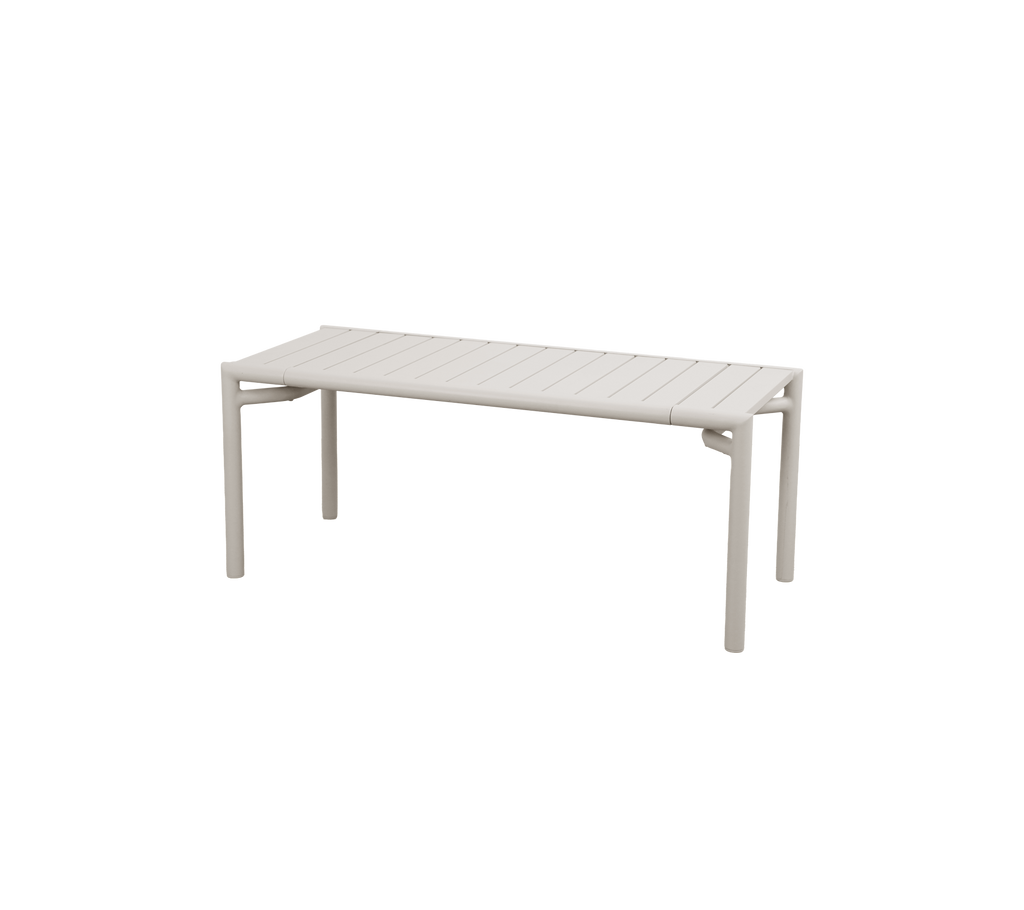 Sand-colored table with a simple design.