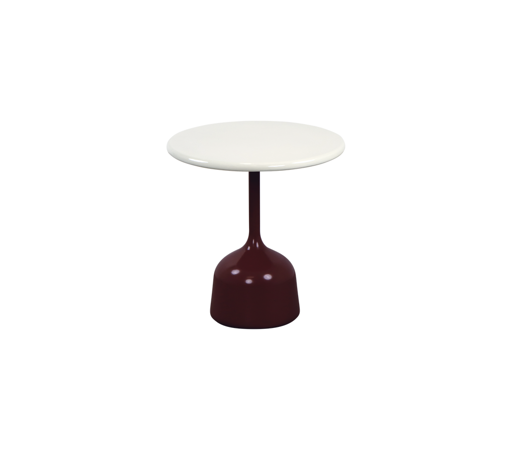 Modern burgundy table with a white top.