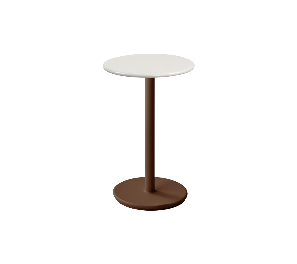 Modern round table with a white top and a desert red base.