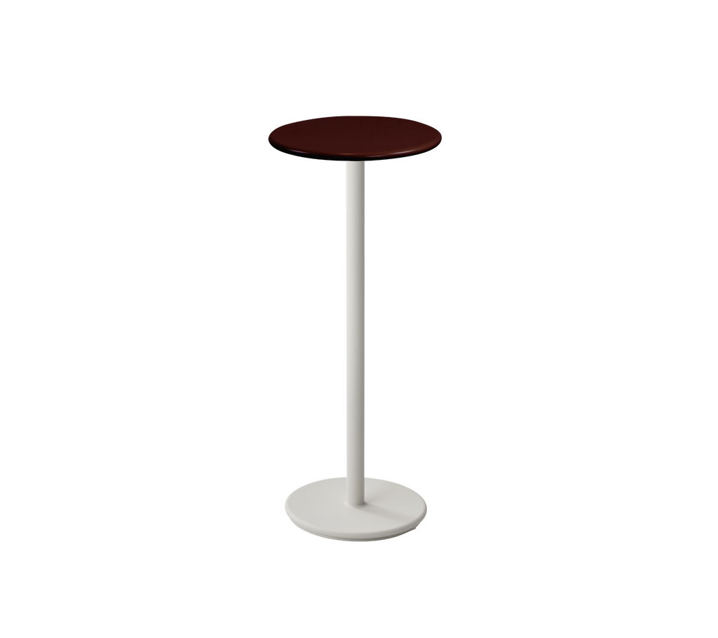 Modern burgundy tabletop on a white pedestal.