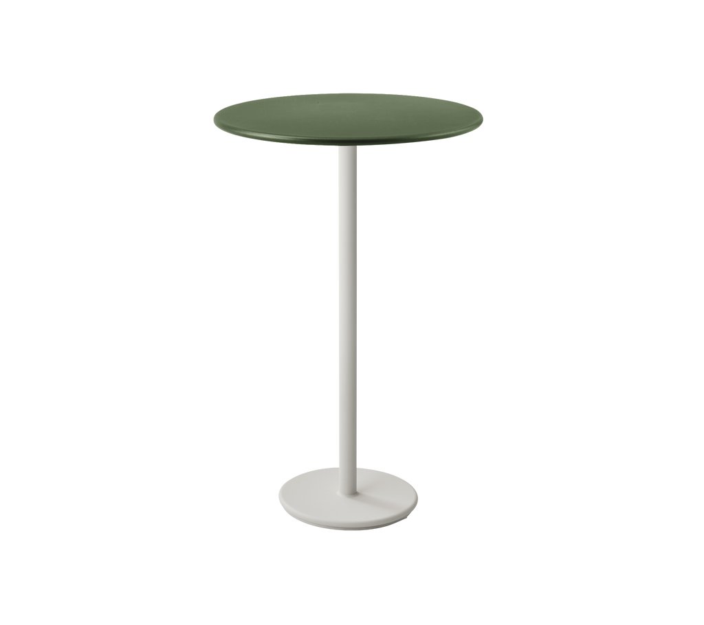 Dark green round table with a white base.