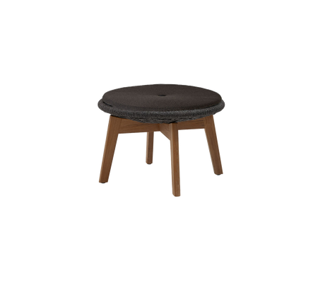 Round padded stool with a dark surface and wooden legs, designed for comfort and style. Ideal for versatile seating arrangements.