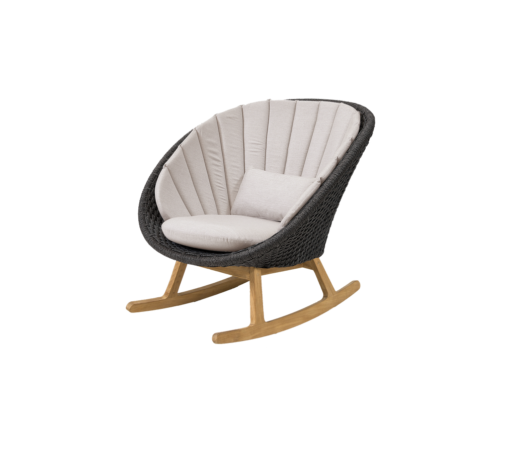 Modern rocking chair with sand cushion and dark grey frame.
