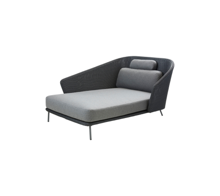 A modern lounge chair with a sleek design, featuring a cushioned seat and angled backrest for comfort and style.