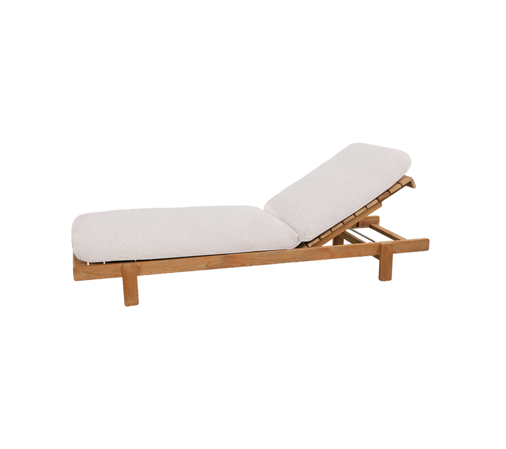 Teak lounge chair with sand cushion in a modern style.