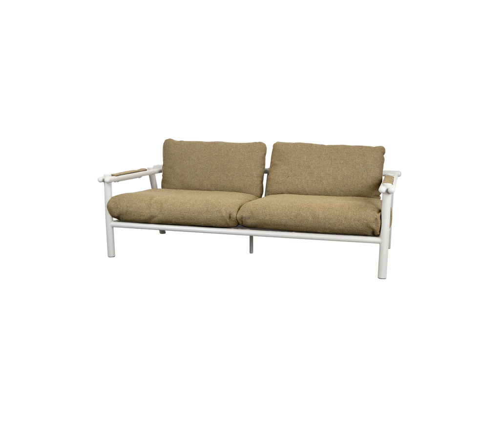 Modern sofa with sand-colored cushions and a light frame.