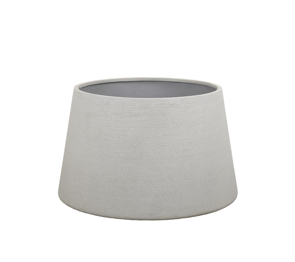 Grey planter with a modern design, featuring a tapered shape.