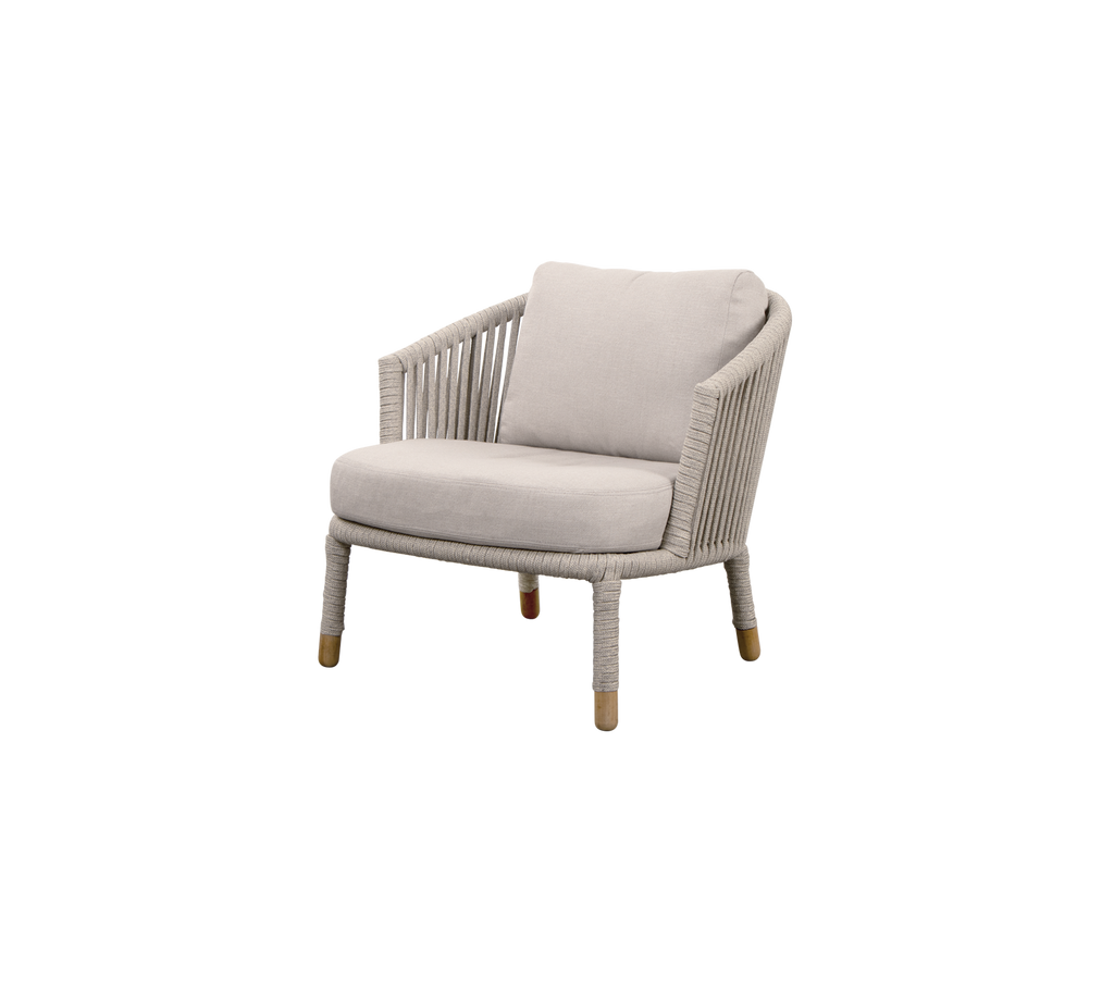 Stylish chair with a comfortable cushion, featuring a woven design and sturdy legs for a modern look. Ideal for relaxation.