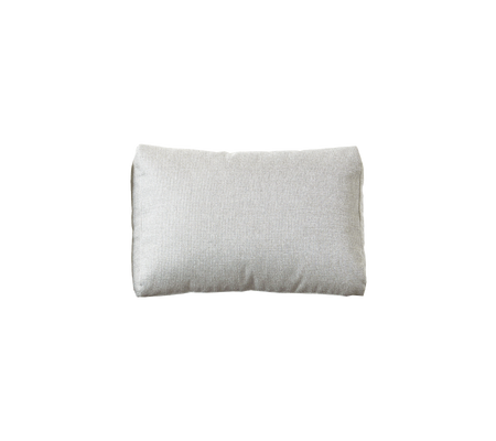Soft rectangular pillow in a light, neutral fabric, designed for comfort and aesthetic appeal. Ideal for home decor or relaxation.