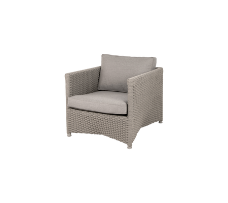 Stylish armchair with a woven base and soft gray cushions, perfect for adding comfort and elegance to any space.