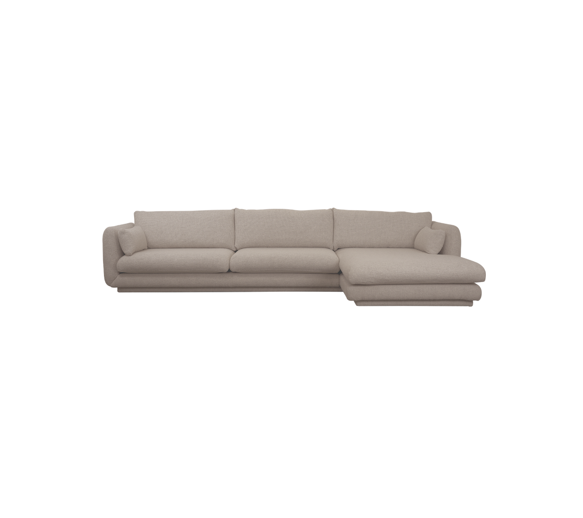 Light brown sectional sofa in a modern lounge setting.