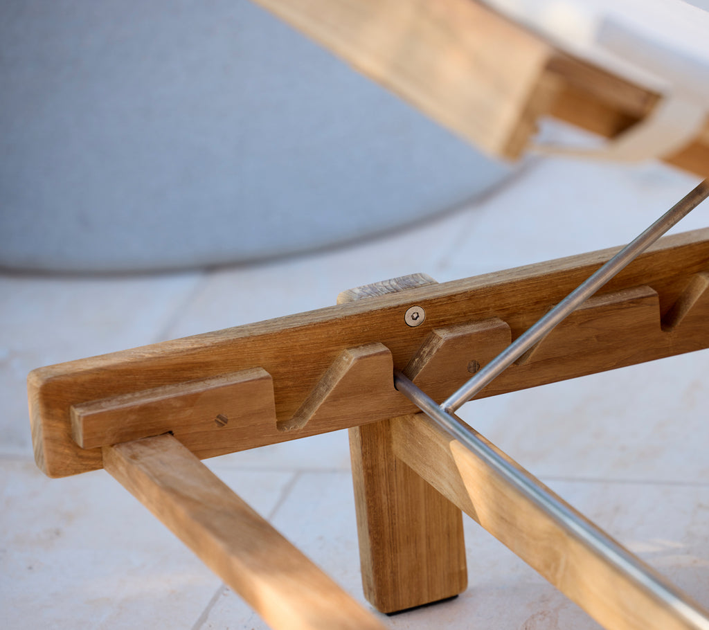 Modern wooden chair with a simple and functional design.